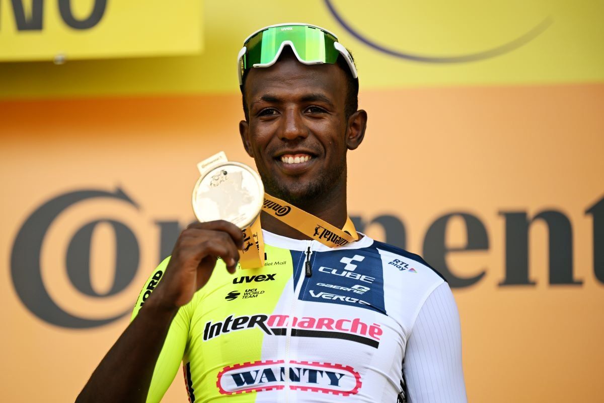 A photo of Biniam Girmay of Eritrea holding his medal as Stage 3 winner of the 111th Tour de France on July 1, 2024.