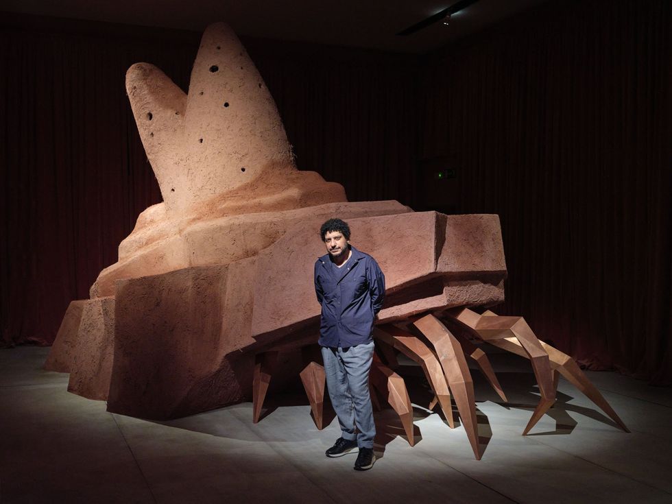 https://www.okayafrica.com/media-library/a-photo-of-wael-shawky-who-is-representing-egypt-at-the-60th-venice-biennale.jpg?id=52039338&width=980