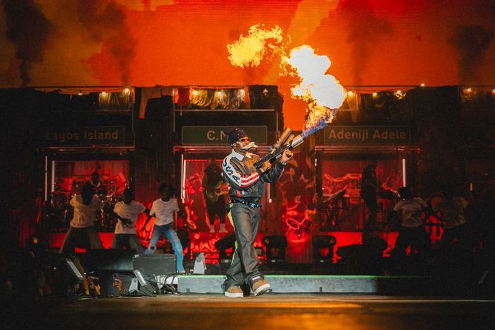 Asake performs on the Afro Nation Portugal Lit Stage with a Flamethrower in hand.
