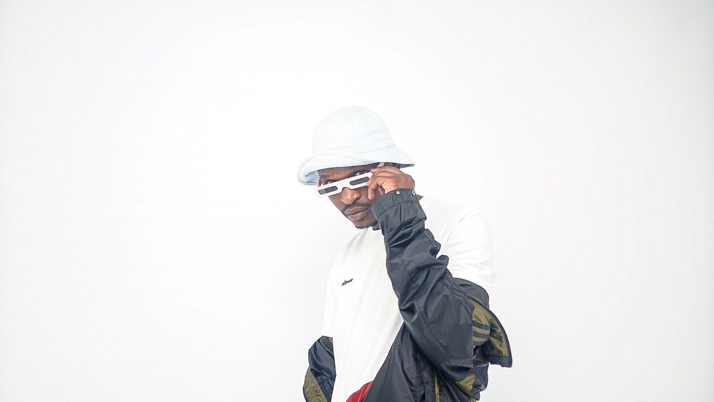 808x poses in front of a white backdrop. 