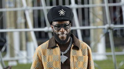 A photo of Burna Boy at the Louis Vuitton Spring/Summer 2025 menswear ready to wear presentation as part of Paris Fashion Week in Paris on June 18, 2024