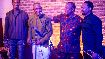 A photo of Herbie Tšoaeli and his band following their performance at the Afrikan Freedom Station.