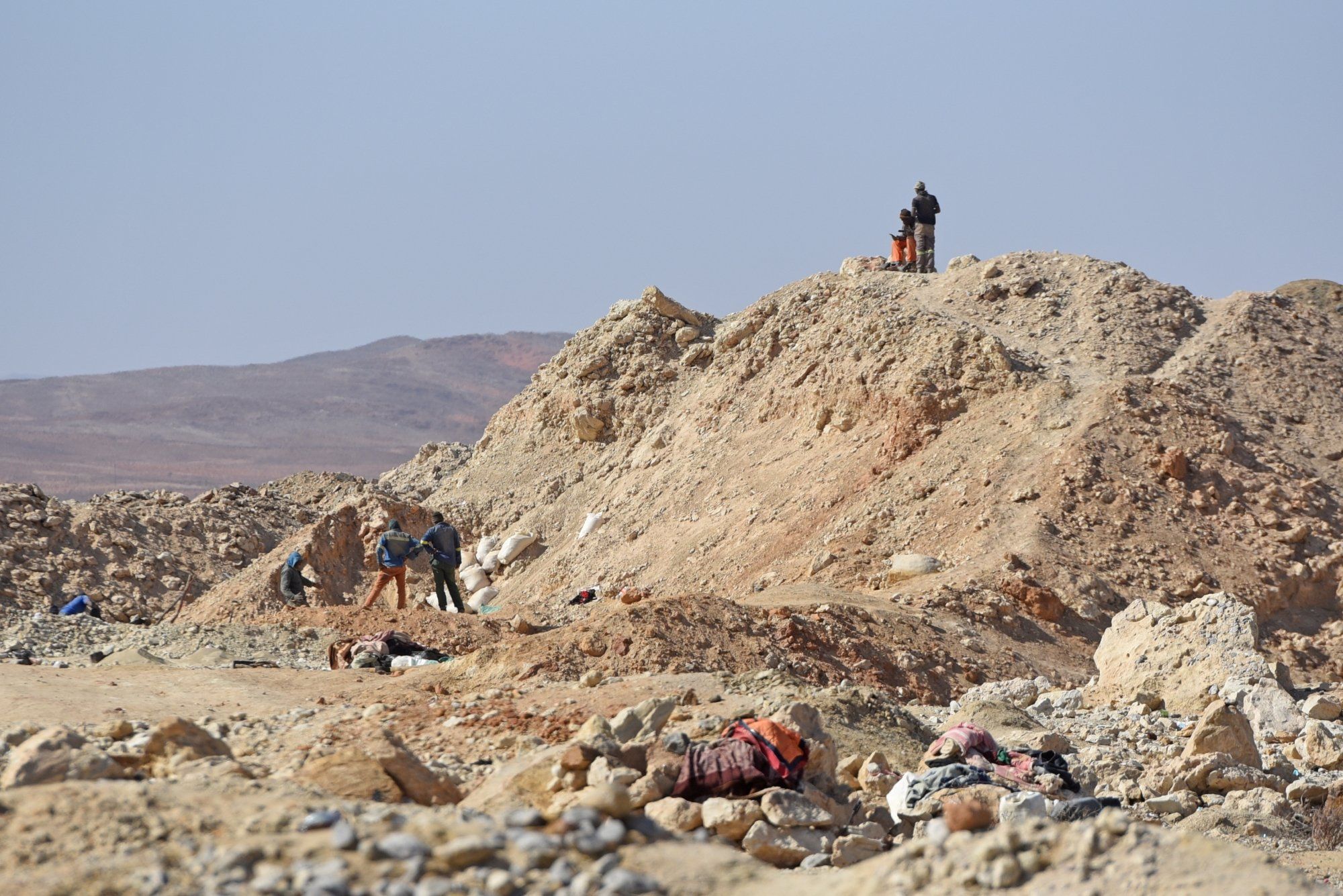 Illegal miners look for diamonds at old abandoned mines.