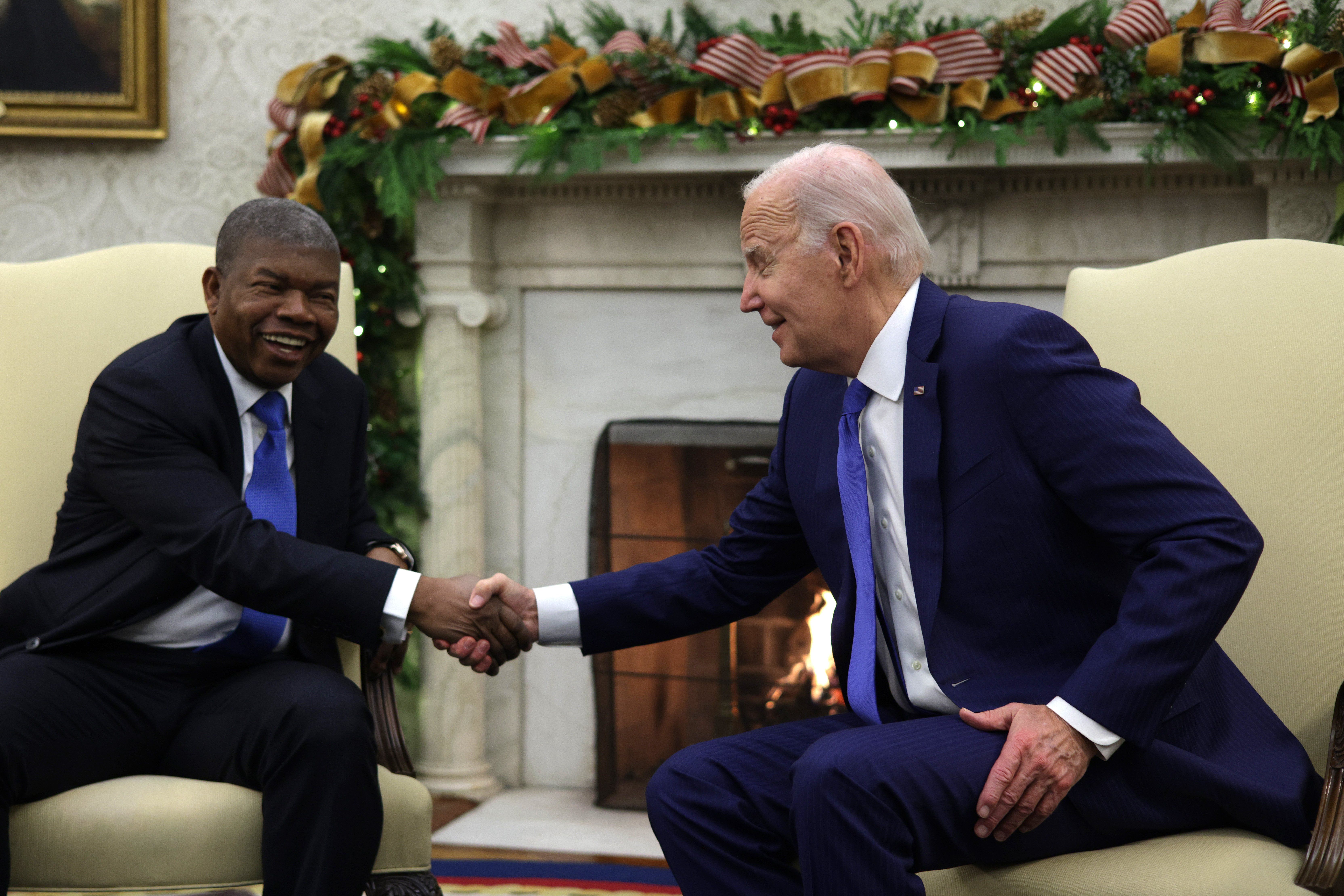 U.S. President Joe Biden shakes hands with President Joao Lourenco of Angola during a meeting in the Oval Office of the White House on November 30, 2023 in Washington, DC.