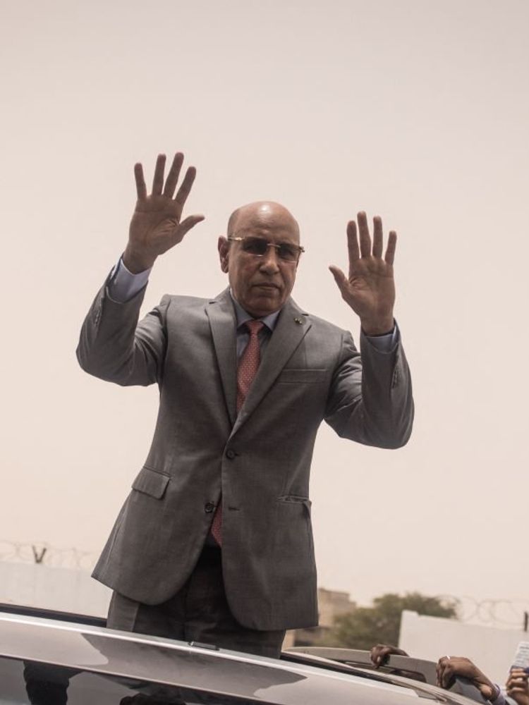 President of Mauritania and leader of the Union for the Republic, Mohamed Ould Cheikh El Ghazouani waves to supporters celebrating his reelection in Nouakchott on July 01, 2024.